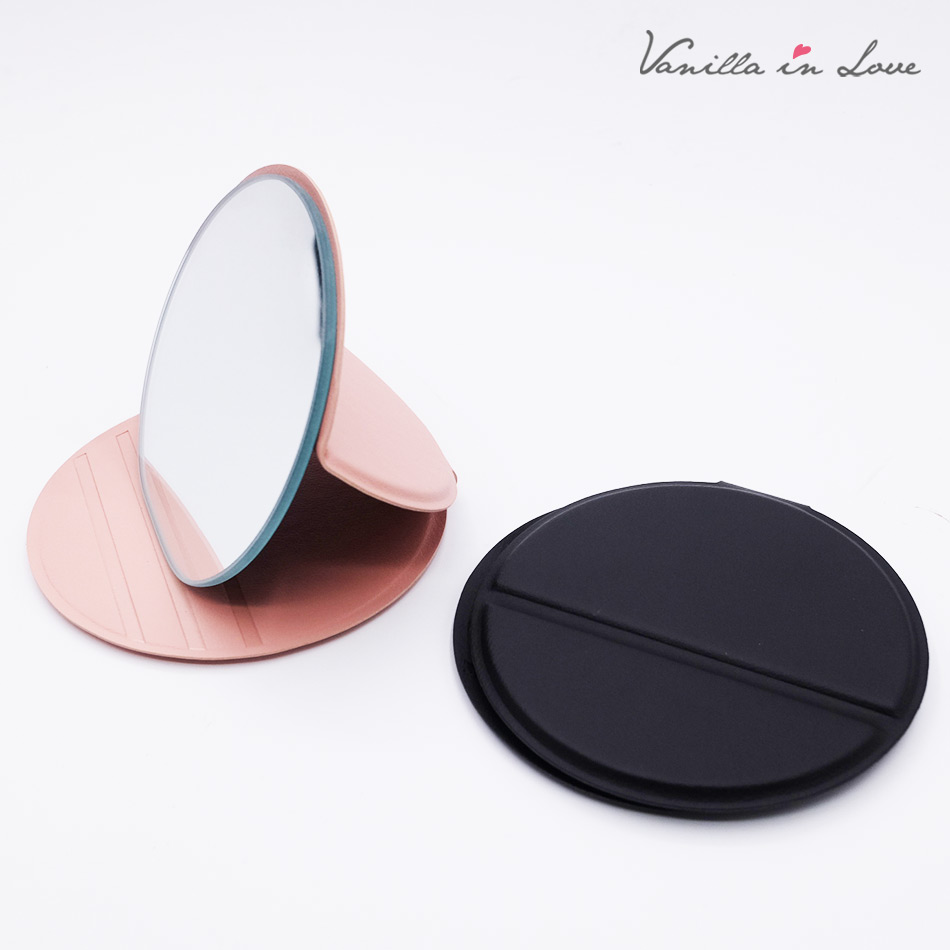 กระจกพับ